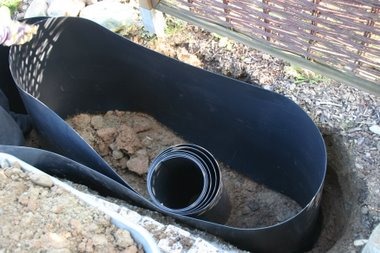Rhizomsperre einbauen